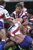 Mark Hughes is met by Roosters defence.