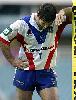 Andrew Johns is disappointed at the thrashing.