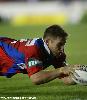 Daniel Abraham dives on a loose ball.