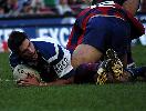 Dennis Scott crosses for a try.