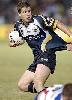 Josh Hannay nearly gets free of a tackle.
