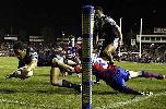 Clinton Toopi dives over for a dodgy try.