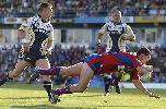 Steve Simpson crosses for try number two.