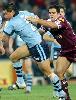 Timana Tahu busts a tackle.