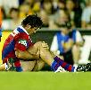 Andrew Johns goes down, subject of a knee complaint, early in the match.