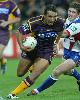 Neville Costigan gets past Matthew Gidley.