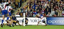 Craig Hall dives over for a great try right on half-time.