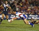 Robbie O'Davis dives over for an early try.
