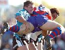 Matt Bickerstaff and Andrew Lomu lift up Matt Kennedy.