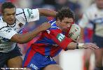 Robbie O'Davis about to break a tackle.