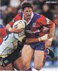 Kurt Gidley hunts for a hole in the Cowboy's defence.