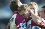 Michael Monaghan celebrates another blinkin' Manly try.
