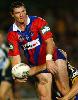 Steve Simpson offloads a pass.