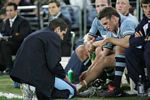 Danny Buderus takes a late breather on the bench.
