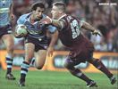 Andrew Johns ducks past Brad Thorn.