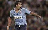 Andrew Johns yells some instructions.