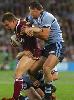 Steve Simpson makes yet another tackle.