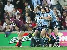 Andrew Johns celebrates after setting up another try, in the massacre.