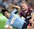 Andrew Johns thumps into the ground.