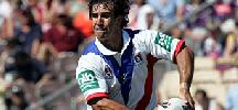 Andrew Johns about to pass.