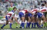Andrew Johns passes from a scrum.