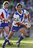 Andrew Johns looks to spark something in attack.