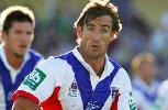Andrew Johns in the action.
