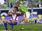 Anthony Quinn is tackled by Jason Smith.