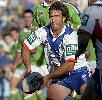 Andrew Johns passing in traffic.
