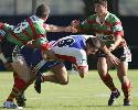 Steve Simpson gets tackled.