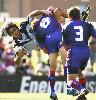 Kurt Gidley smashes Jerome Ropati.
