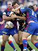 John Skandalis runs into some bruising Knights defence.