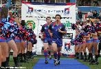 Andrew Johns leads the side out.