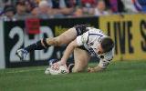 Brent Tate dots down under the posts.