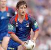 Andrew Johns about to put it on the toe.