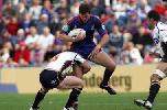 Matt Gidley is grabbed by the leg.