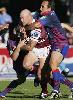 Craig Smith tackles Ben Kennedy.
