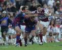 Craig Smith pulls down Chris Hicks.