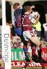 Michael Monaghan out-jumps a Knight.