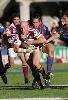 Adam Woolnough pulls down Ben Kennedy.