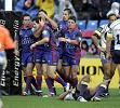 The Knights celebrate Jarrod Mullen's first try.