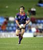 Andrew Johns prepares to kick.