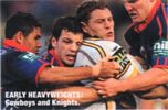 Brad Tighe, Jarrod Mullen and Todd Lowrie take down Aaron Payne.