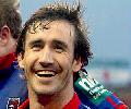 ... as Andrew Johns makes his way from the field.