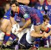 ... aaand Andrew Johns continues to offload 0.1 seconds later!