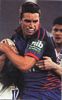 Danny Buderus tries to shrug off Bulldogs defenders.