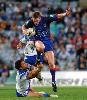 Anthony Quinn hurdles a Bulldog.
