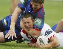 Dustin Cooper takes care of Shaun Timmins.