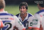 Andrew Johns talks to his players after the loss.