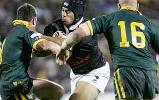 Iafeta Paleaaesina is brought down by Danny Buderus.